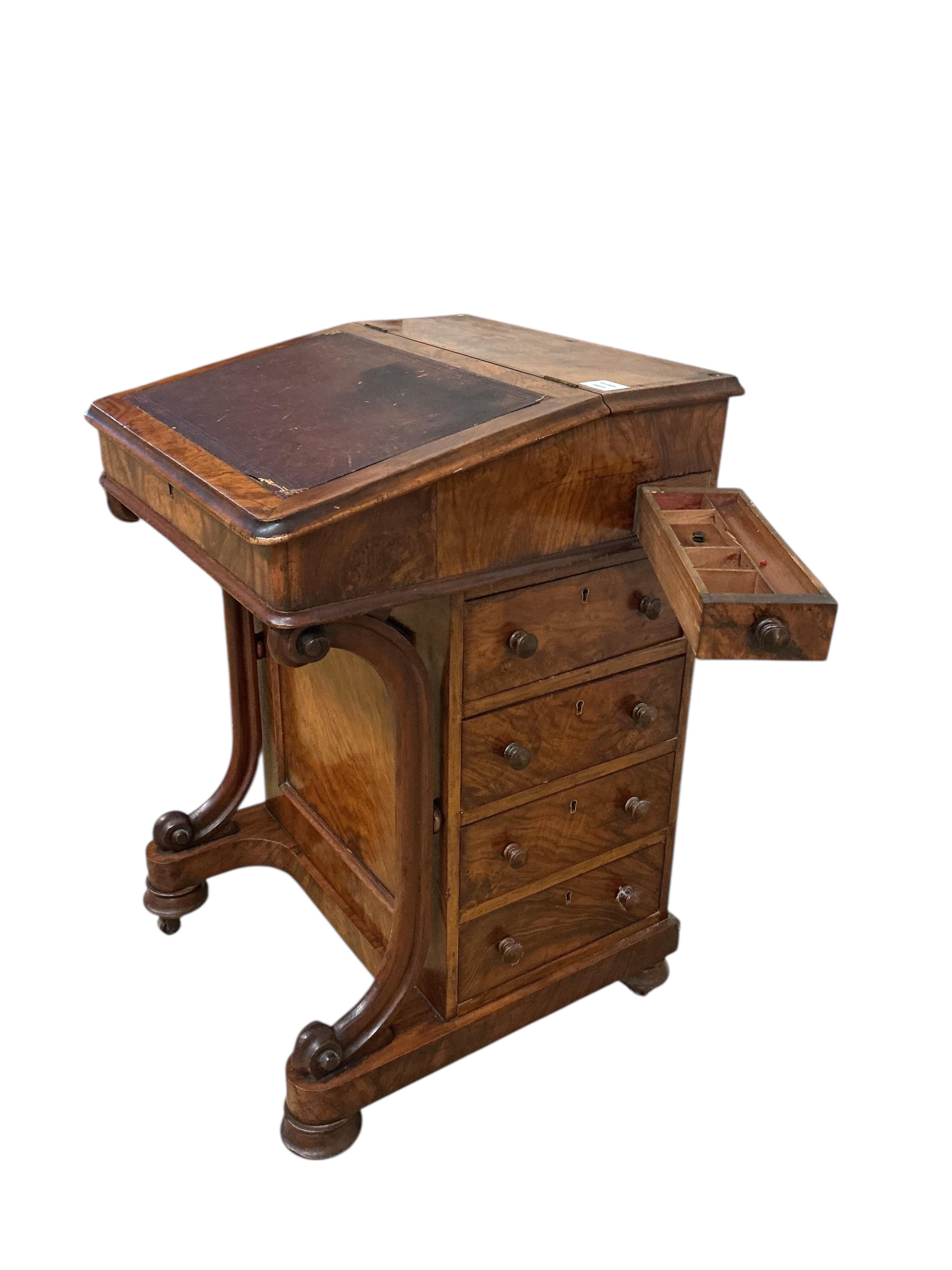 A Victorian figured walnut Davenport, lacks superstructure, width 53cm, depth 53cm, height 81cm